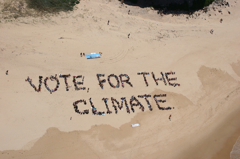 vote-for-the-climate-human-sign